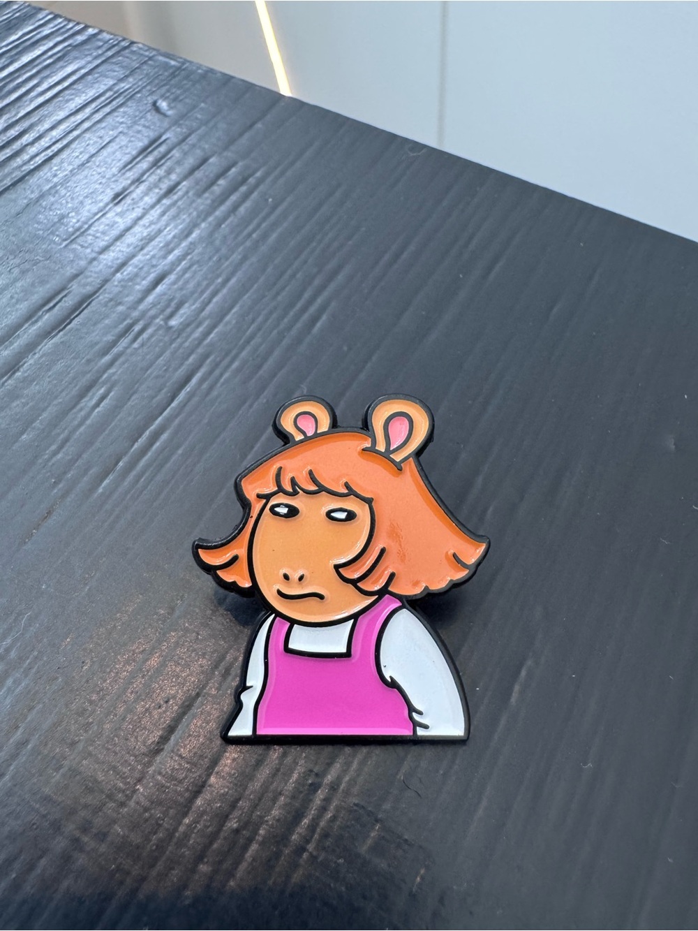 Side Eye DW brooch pin.